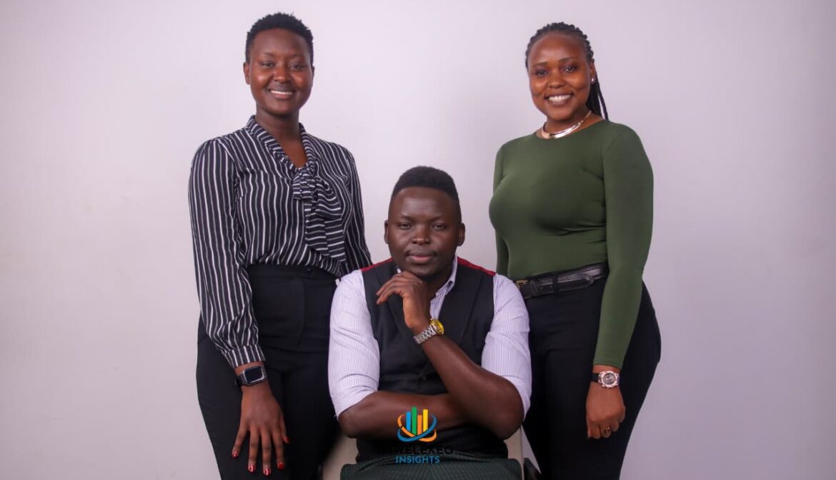 Tony Nyakoko flanked by Fridah Mong’are and Sheilah, all from Mwelekeo Insights’ research department. Photo: Mwelekeo Insights