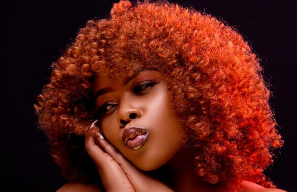 Lydia Oginga smiles durimg a past photo shoot. Photo: Lydia Oginga Source: Facebook