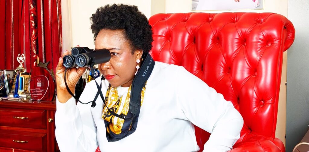 City tycoon Agnes Kagure using a binocular. Photo: Agnes Kagure Source: Facebook